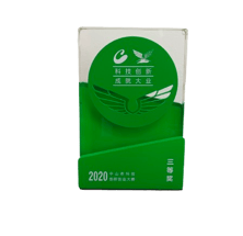 a green box of tea bags with a green leaf