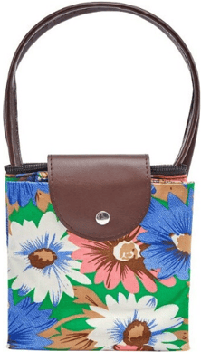 a small purse with a floral print on it