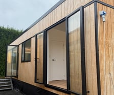 large, open doors on tiny home