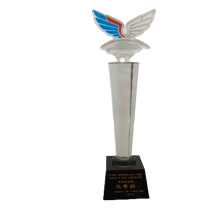 a trophy with a blue and white wings