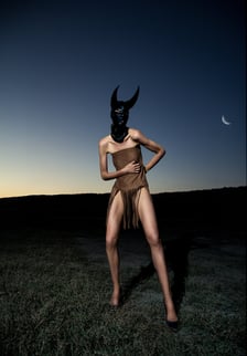 Elizabeth Lotz (Liz Lotz) art director fashion storyteller artist abstract editorial with masked model wearing horns and elon