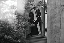 Elizabeth Lotz (Liz Lotz) art director fashion editorial in architectural landscape with two models in black and white elegan