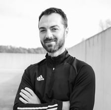 a man with a beard and a black and white photo