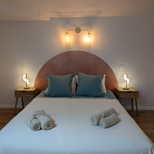 a bed with towels and towels on it