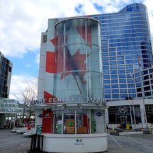 Canada Place Welcome Centre - a building with a large canadian flag on it