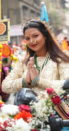 woman in maharastrian traditional outfit riding a motorbike in girgaon gudipadwa shobhayatra 2025