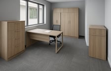 a modern renovated office room with new furniture and cabinetry