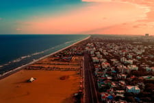 A beautiful view of sea alone with city view with sky background