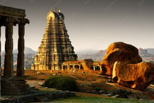 A Shrine of a hindu temple carved in the ancient time with a beautiful sky background 