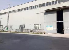 Side photo of the factory building.