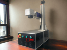a computer monitor and a computer monitor on a table