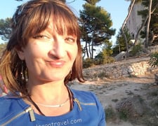 Alonga travel the author in Dubrovnik smiling happily about being there