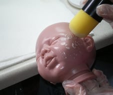 Vinyl Head Being Sealed