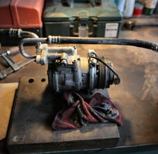 a carbuilder with a hose and a hose