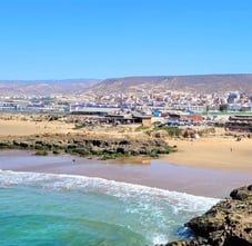 a beach with a view of taghazout