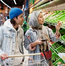 a man and woman in a grocery store