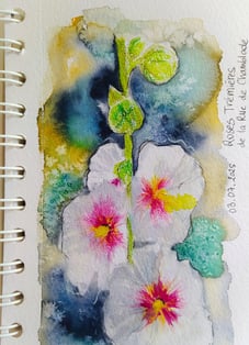 a notebook with a drawing of a flower