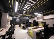 a large office with a large desk and a large desk wedding photographers near me  l ties and bonds