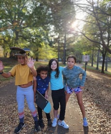 a group of girls smiling 