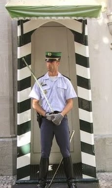 Lisbon - An official guard to a historic building under repair