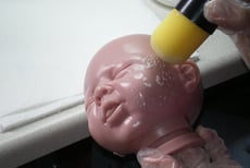 Vinyl Head Being Sealed