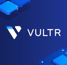a blue and white vultr logo with a blue background
