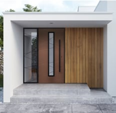 a modern house with a wooden door and a wooden door