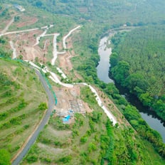 a river with rocks and rocks in the foreground