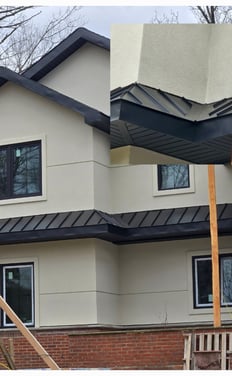 Residential roof and gutter replacement project in progress