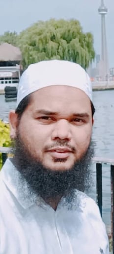 Photo of Dr. Kaleem at Toronto Islands, CN tower could be noticed in the background.