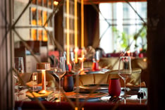 a table setting with candles and candles