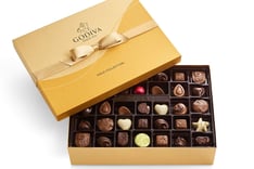 Subscription service that delivers gourmet chocolates to her door