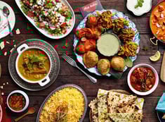 Zayka Caterers’ menu image of Kashmiri cuisine with rogan josh, naan, Dum aloo and more