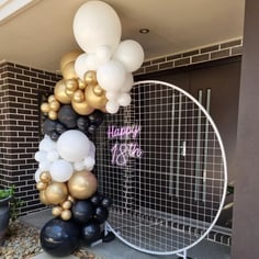 Circle mesh backdrop with happy 18th neon and balloon garland at birthday in Loganholme.