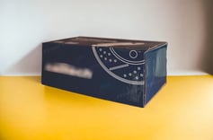 Corrugated folding carton for new brake caliper