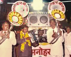 Manohar Brass Band in the old days, fully geared with all equipment and performing enthusiastically.