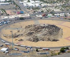 a large pile of rubble in a city