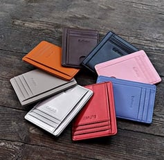 a group of multiple different colored buffway slim wallets