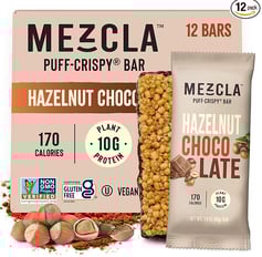 a box of chocolate hazelnuts and hazel nuts