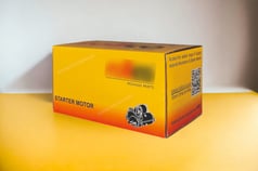 Corrugated folding carton for starter motor