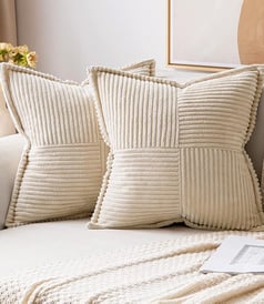 a couch with pillows and scatter cushions and accent pillows 