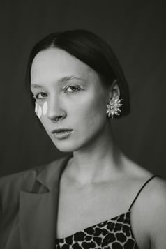 a woman with a nose piercings
