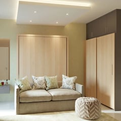 omegaa solutions interior designers queen size wall mounted bed with storage and sofa