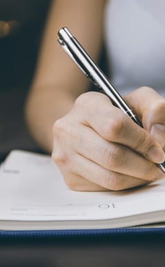 woman writing notes