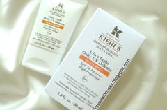 a bottle of Kiehl's skin care products