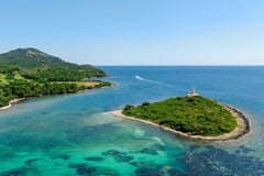 Panoramic shot of Alcanada Island, a key stop on Balea Charters boat tours in Mallorca