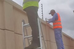 I plug cable installation electric fence work in Ghana