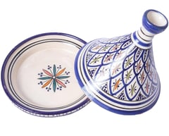 a blue and white ceramic vase with a blue and white pattern