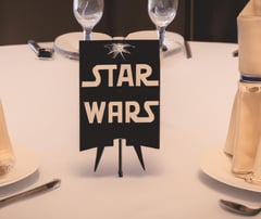 a star wars themed table setting with a star wars themed table