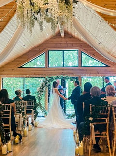 Couple and David Allbut Celebrant Conducting Their Ceremony